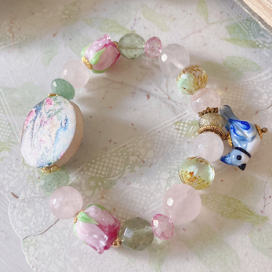 Reserved for a VIP: Women’s Spring Rose Teacup Pastel Whimsy Bluejay Talisman Stretch Bracelet (Complimentary)