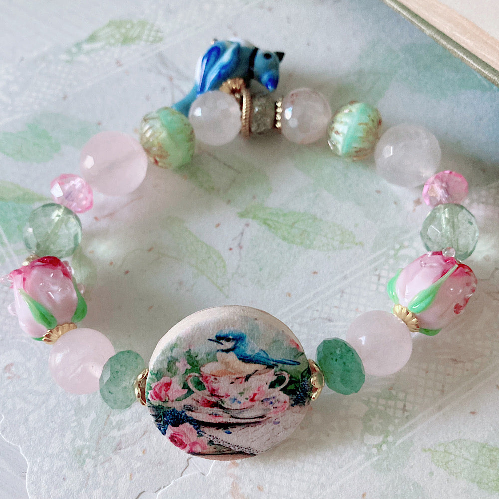 Reserved for a VIP: Women’s Spring Rose Teacup Pastel Whimsy Bluejay Talisman Stretch Bracelet