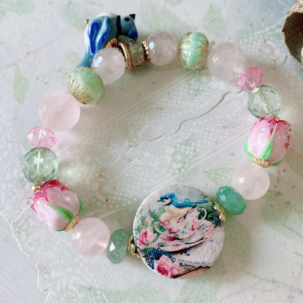 Reserved for a VIP: Women’s Spring Rose Teacup Pastel Whimsy Bluejay Talisman Stretch Bracelet